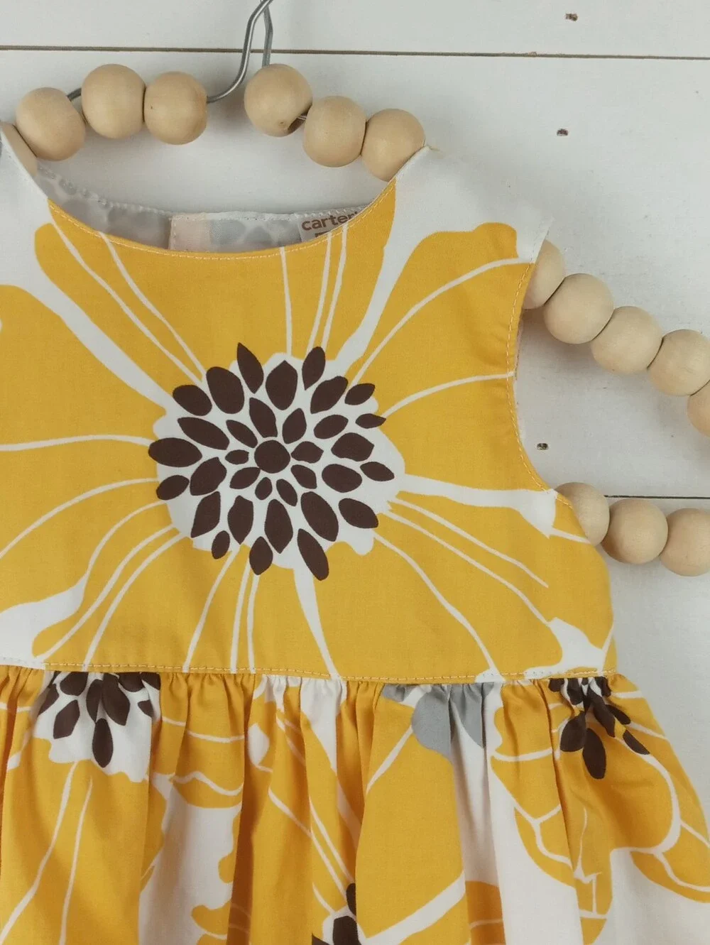 Carter’s girls size 9 mos white and yellow large floral design dress buttons